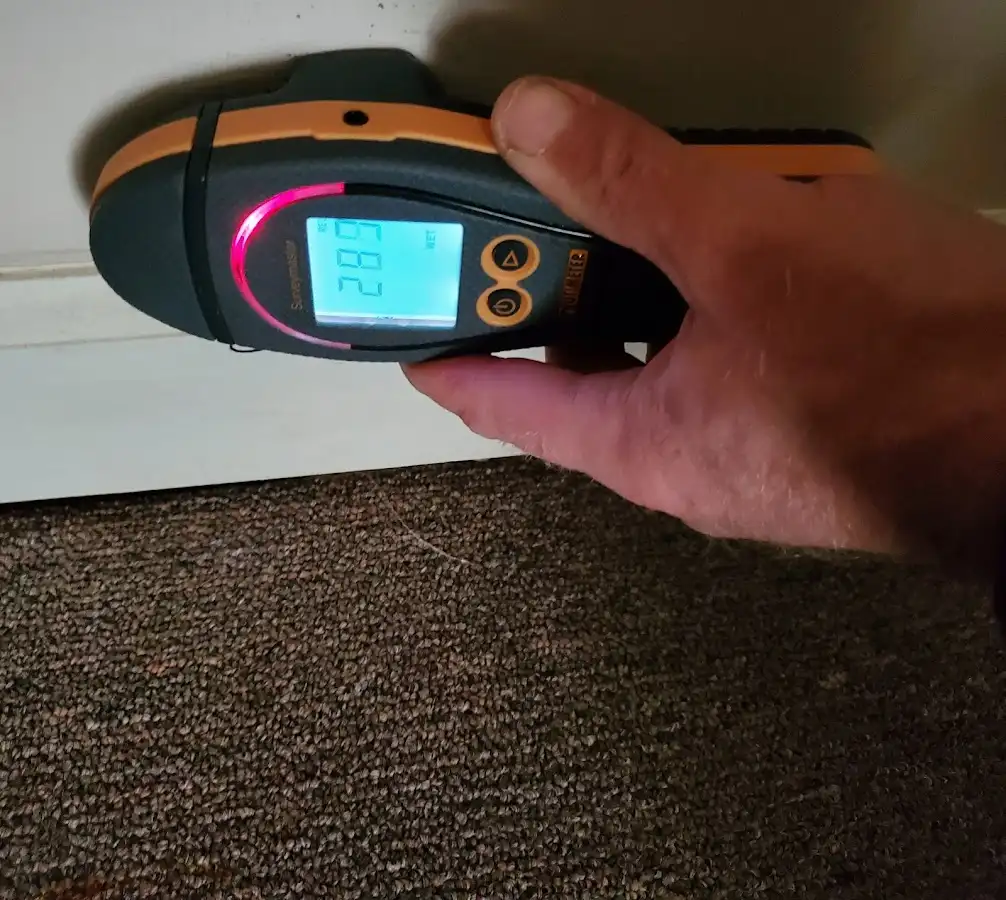 Moisture detection at baseboard during Storm Damage Restoration in Bethlehem